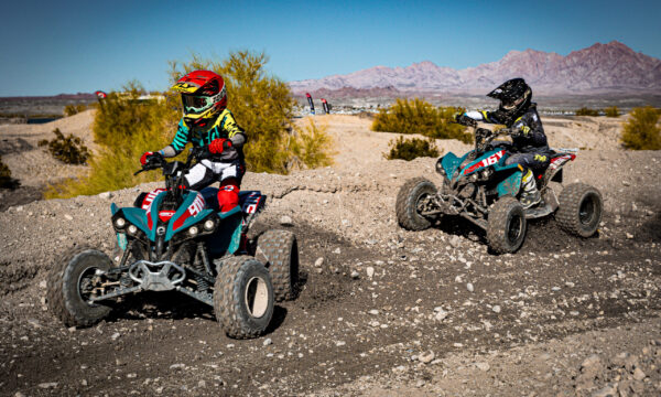 NXgen racers #16 and #911 battling through a burm NXgen racers #16 and #911 battling through a burm