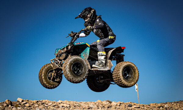 NXgen racer #16 coming over a jump NXgen racer #16 coming over a jump