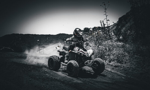 NXgen racer coming around a left turn NXgen racer coming around a left turn in black and white
