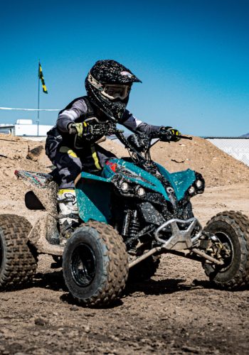 NXgen racer #16 coming through the straightaway section on race track