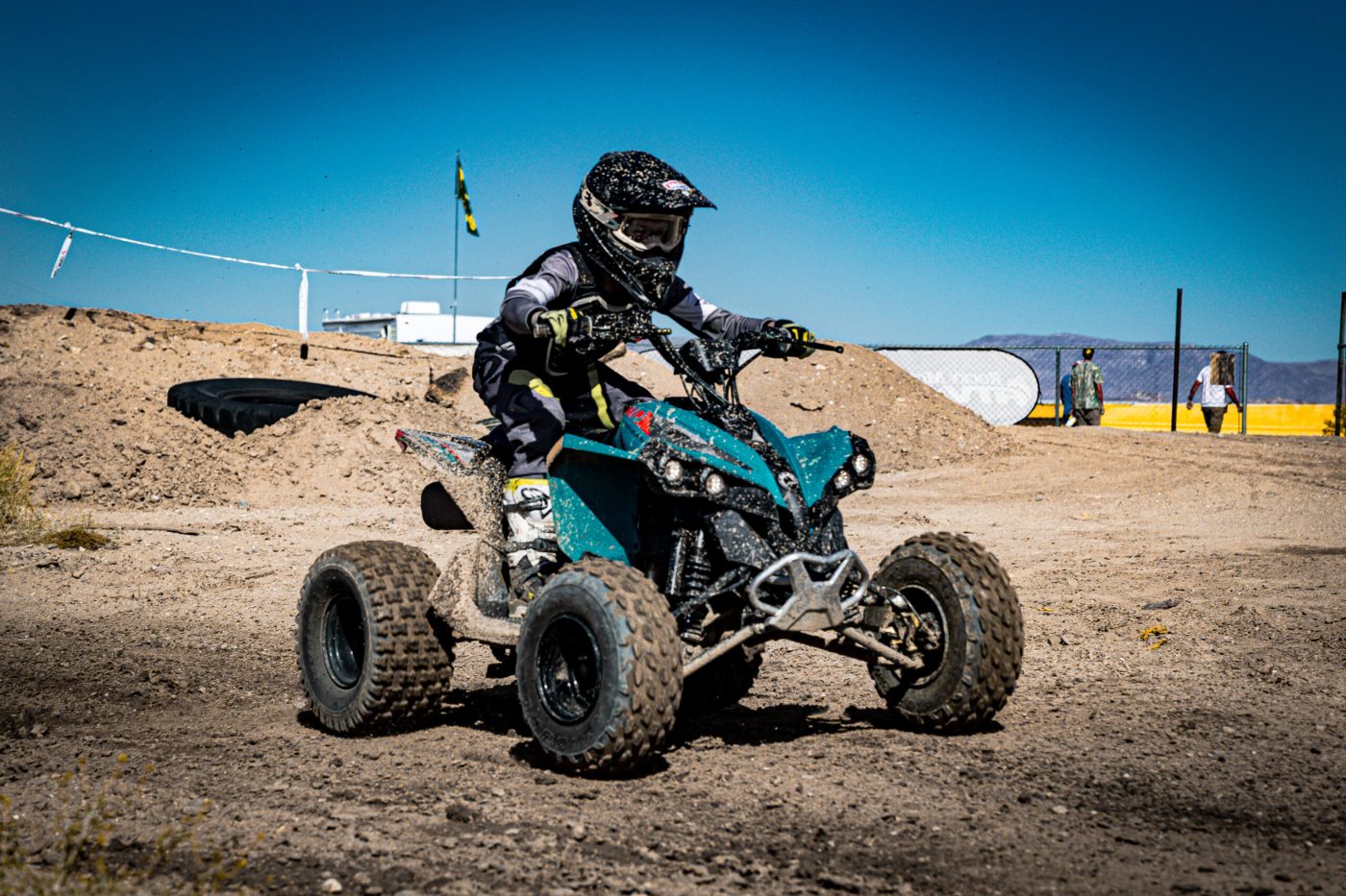 NXgen racer #16 coming through the straightaway section on race track