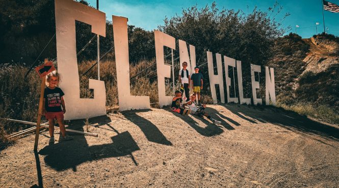 5 NXGen race kids at the Glen Helen sign