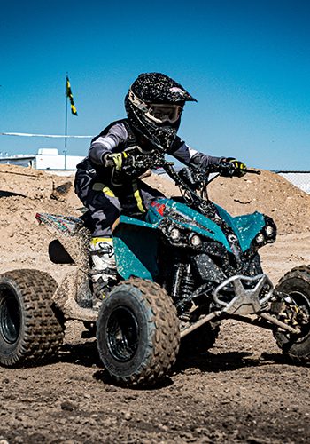 NXgen racer #16 coming down a straight away